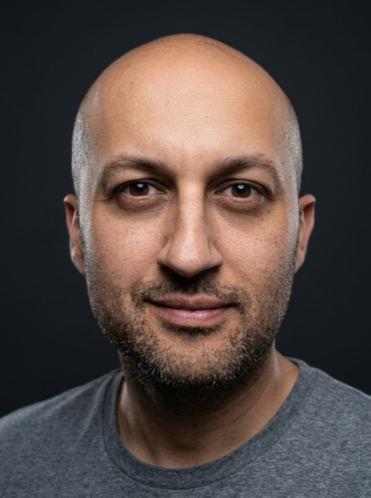 Ali Husain headshot